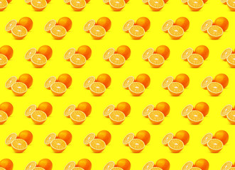 Seamless Pattern of Orange Fruits on Yellow Background. Natural Citrus Pop Art Background, High Resolution Photography                     