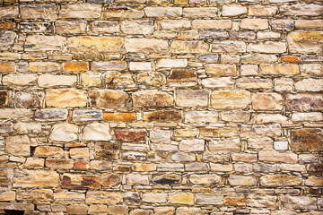 Stone brick wall of one of the houses on the island of Cyprus