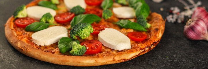 pizza, broccoli, tomato sauce, cheese and more. food background