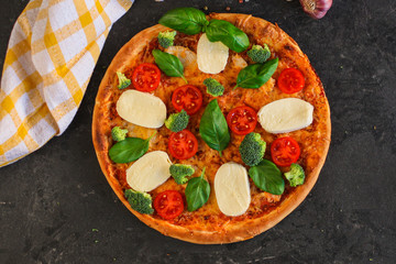 pizza, broccoli, tomato sauce, cheese and more. food background