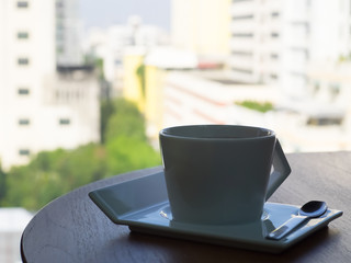 hot coco cup on wood table, hot chocolate milk in the morning.