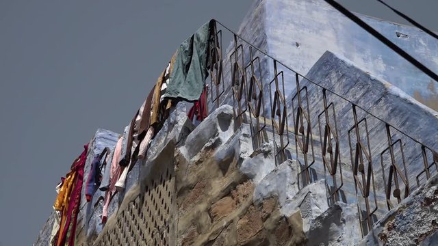 An extreme close up of artistic patterns on the walls of a building