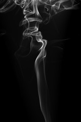 Movement of white smoke on black background