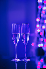 A pair of glasses of champagne in the interior. Holiday's concept.