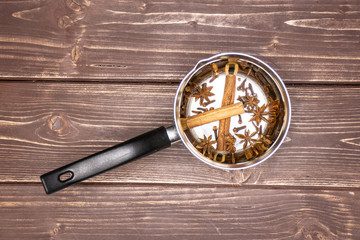 Recipe step by step hot red mulled wine on brown wood