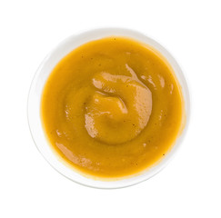 Tasty sauce in bowl on white background