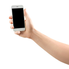 Young man holding mobile phone on white background