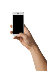 Young man holding mobile phone on white background