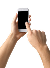 Young man holding mobile phone on white background
