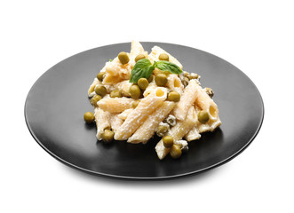 Plate with tasty penne pasta on white background