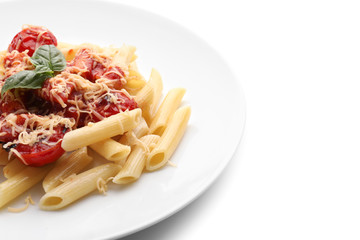 Plate with tasty penne pasta on white background