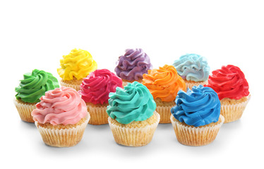 Colorful cupcakes on white background