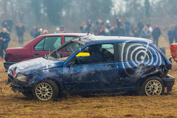 a race of cars that hit each other. old broken cars in crashes during a race. auto catch and car crash rally