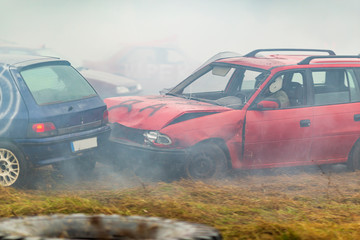 a race of cars that hit each other. old broken cars in crashes during a race. auto catch and car crash rally