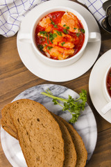 fish soup in a bowl with home baked bread