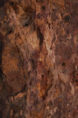 Red and brown big stone