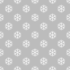 Simple snowflake pattern on grey background.