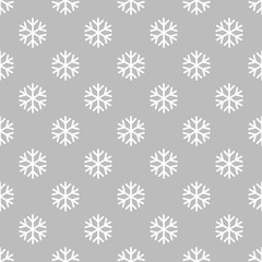 Simple snowflake pattern on grey background.