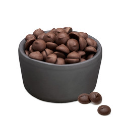 Chocolate morsels in bowl isolated on white background. Including clipping path.