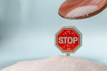 Stop sign on the sugar, warned that the sugar too much will make unhealthy nutrition, obesity,...