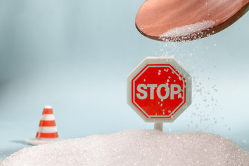 Stop sign on the sugar, warned that the sugar too much will make unhealthy nutrition, obesity,...