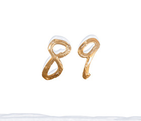 Gold Number 89 with Snow on white background