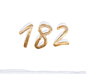 Gold Number 182 with Snow on white background