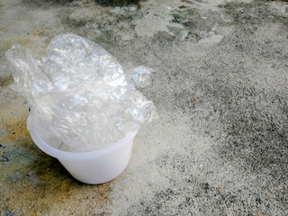 Garbage bags of Shopping Handle Disposable Plastic Bag . Say no to plastic bags . eco activist holding a globe. Ecology conversation Concept .