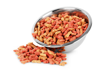 Dry pet food in a metal bowl on a white background © vadarshop