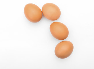 Raw chicken eggs on white background
