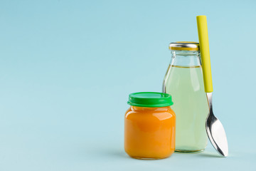 Jarred puree, bottle of juice