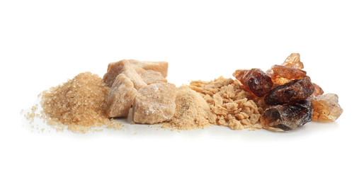 Different kinds of sugar on white background