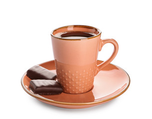 Cup of tasty aromatic coffee with chocolate candies on white background
