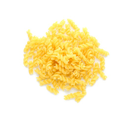 Uncooked fusilli pasta on white background