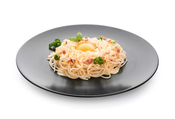 Plate with delicious pasta carbonara on white background