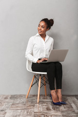 Confident african business woman wearing suit
