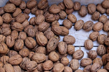 Italy, Piemonte: Walnuts at the market.