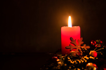detail shot of a nice advent wreath with burning candle