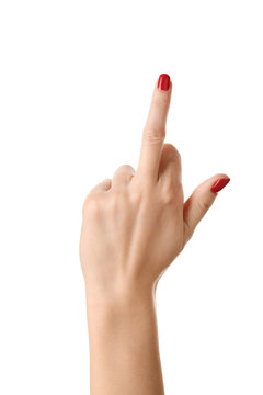 Female hand showing middle finger on white background
