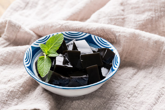 Closeup of traditional Chinese herb food Guiling Jelly. Guilinggao, a traditional Chinese Herb-Made Dessert.