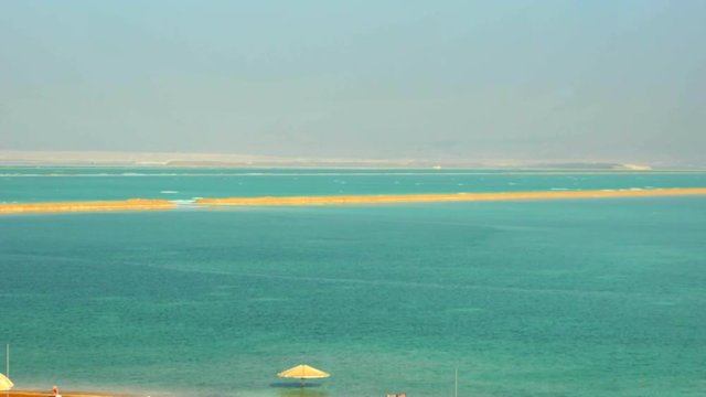 Blue sky over Dead sea surface. Neve Zoar. Israel