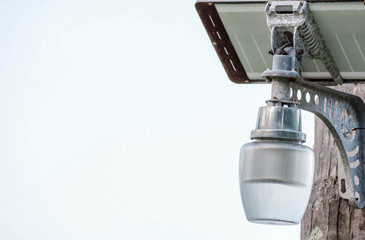 Fototapeta na wymiar Solar powered post lamp that can work without electricity