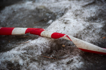 Protective tape on dirty snow