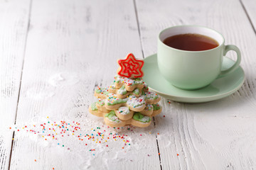 Ginger Cookies in shape of pine tree on Christmas Table