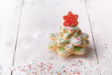 Pine tree Christmas cookies with festive decoration with copy space
