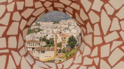 Competa, Malaga, Andalusi, Spain - November 10, 2018: Fisheye-shaped mosaic in a viewpoint over the town of Competa, Málaga in the region of Andalucia, Spain