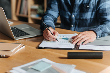 Modern Businessman Writing at His Office