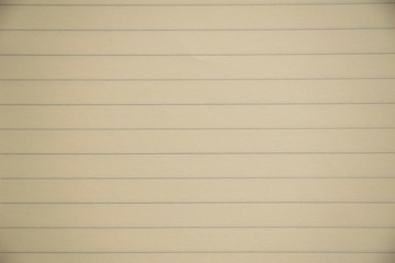 closeup old yellow / brown notebook paper texture with line