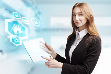 The concept of business, technology, the Internet and the network. A young entrepreneur working on...