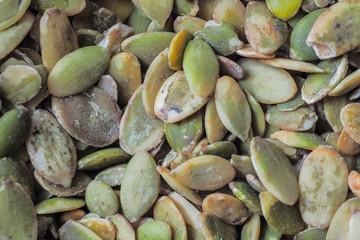 Pumpkin seeds as a backgroun.